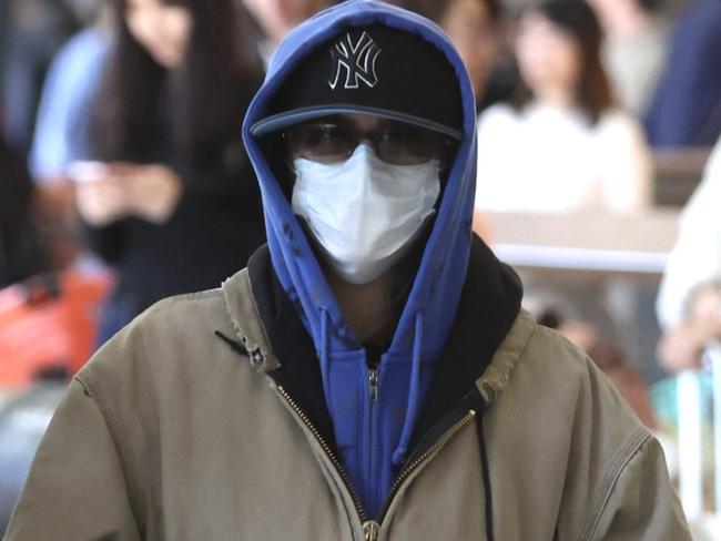 ONE TIME WEB USE FOR NEWS.COM.AU ONLY - FEES APPLY -  Guess Who! American Global Music superstar makes an incognito arrival in Australia ahead of their Australian tourBillie Eilish covered up in a hoodie, baseball cap, mask and sunglasses as she made her way through Melbourne airport .EXCLUSIVE17 February 2025ÃÂ©MEDIA-MODE.COM