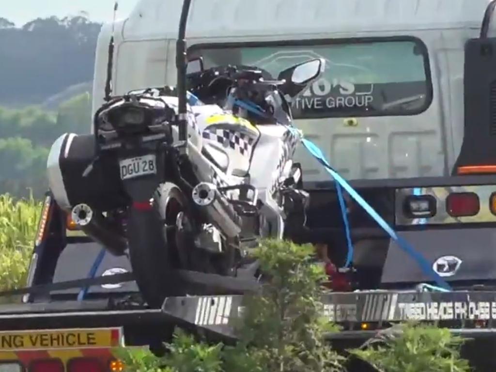 The police bike being towed away. Picture: 9 News