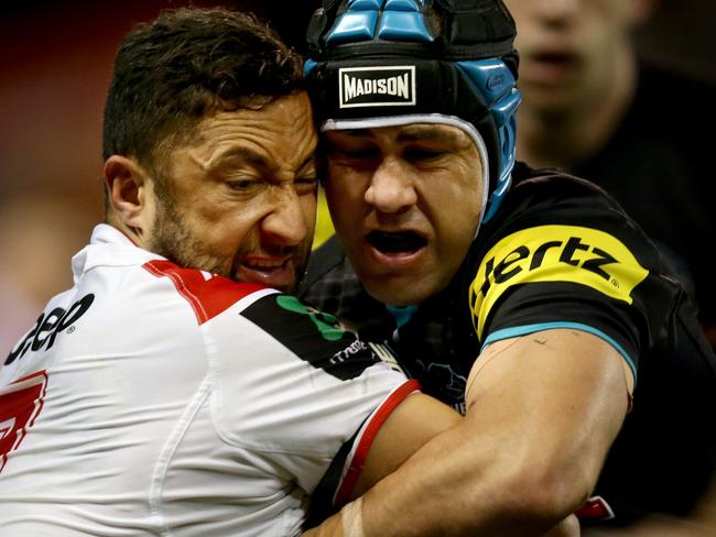 Jamie Soward tackles Benji Marshall during a clash between the Dragons and the Panthers. Picture Gregg Porteous