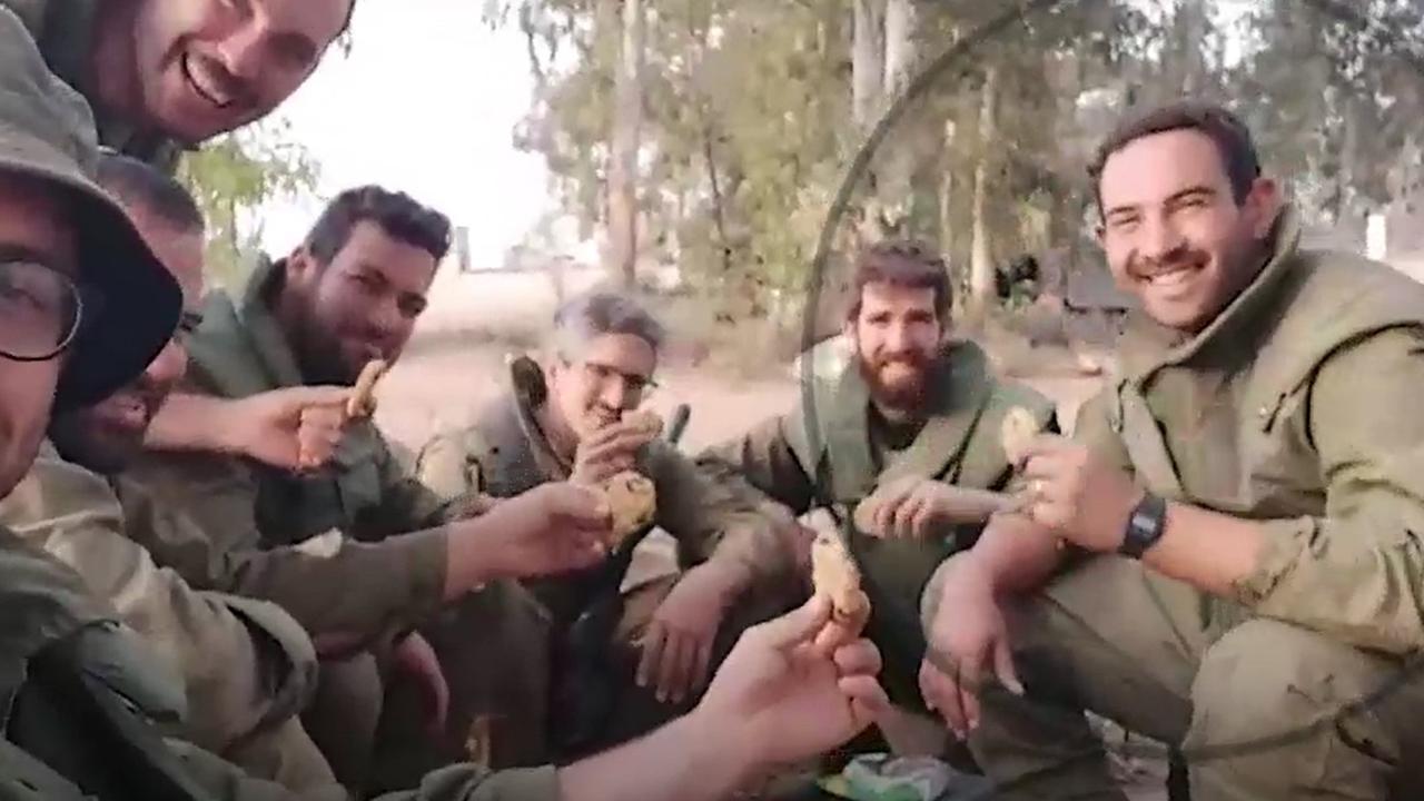 Captain Sivan (right) was awaiting leave to be with his pregnant wife, Liav, and their two-year-old son. Picture: ABC News