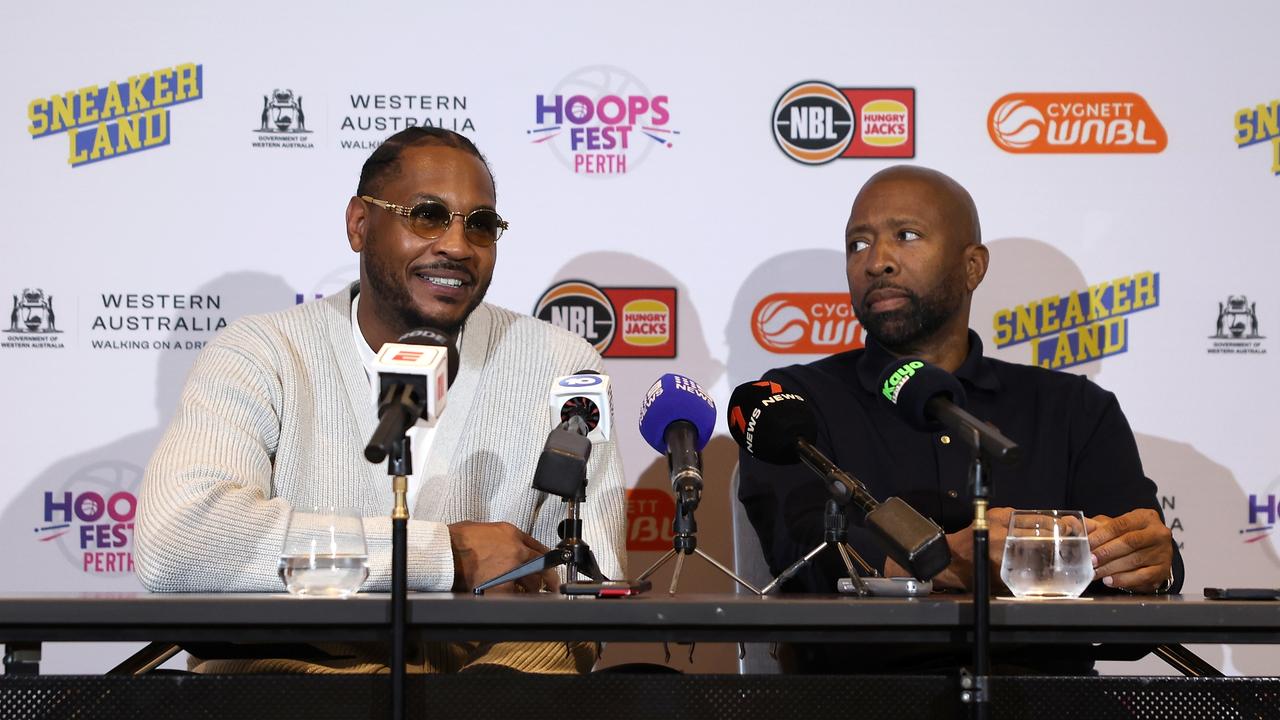 Carmelo Anthony speaks to the media with Kenny Smith. (Photo by Paul Kane/Getty Images for NBL)