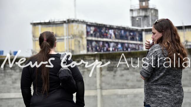 Cassandra Sainsbury's mother and sister behind the jail El Buen Pastor in Bogota Picture: Guillermo Legaria