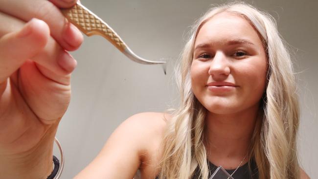 S.bbeautyy owner Shania Gibson has won the Bulletin's best eyelash technician on the Gold Coast competition. Shania at work with a client. Picture Glenn Hampson