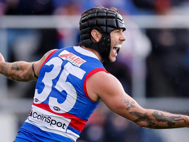 BALLARAT, AUSTRALIA - AUGUST 25: Caleb Daniel of the Bulldogs celebrates a goal during the 2024 AFL Round 24 match between the Western Bulldogs and the GWS GIANTS at Mars Stadium on August 25, 2024 in Ballarat, Australia. (Photo by Dylan Burns/AFL Photos via Getty Images)