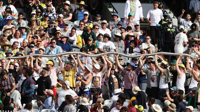 Punters produce a giant beer snake. Picture: Michael Klein