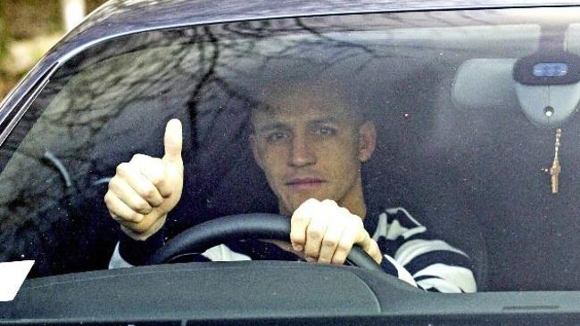 Alexis Sanchez arrives at Arsenal training.