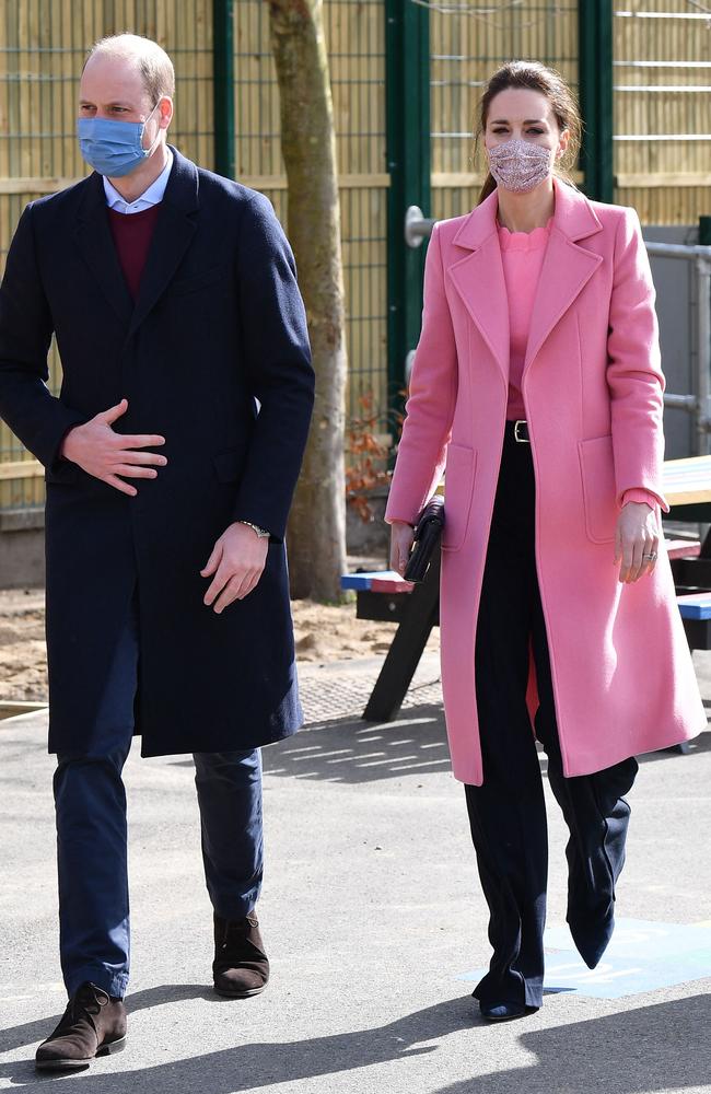 The couple wore face masks for their visit to a school that has just reopened after COVID-19 restrictions were eased in the UK. Picture: Justin Tallis / various sources / AFP