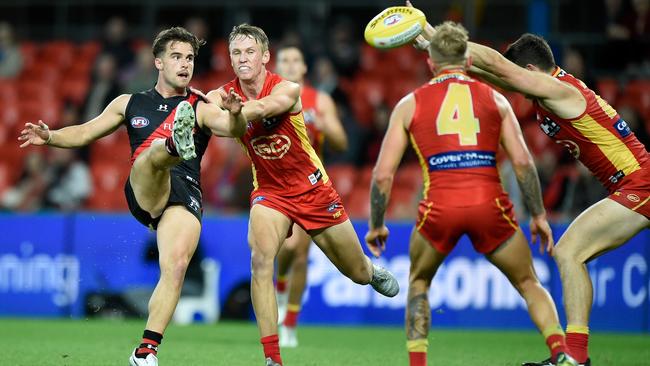 Will Snelling of the Bombers kicks a goal at Metricon Stadium Picture: Getty Images