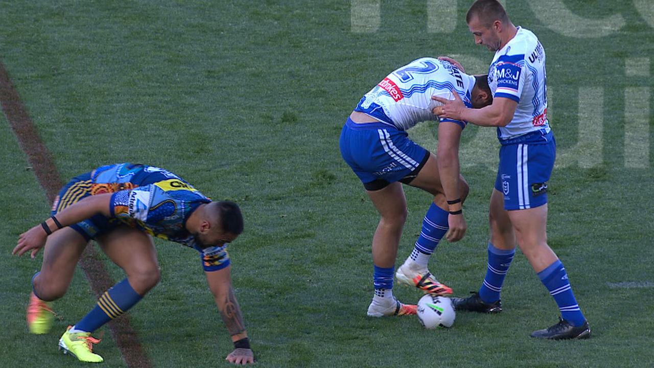 Dallin Watene-Zelezniak loses his direction in a tackle and gets up to play the ball the wrong way.