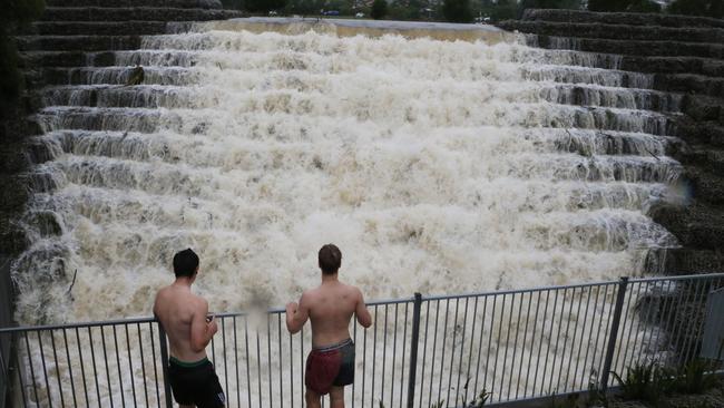 Flooding on the Northern Gold Coast. A drain turn into a giant waterfall at Pacific Pines. Picture: Glenn Hampson