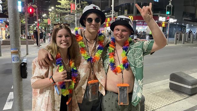 Charlotte Houley (17), Jayden Merenda (17), Marshall Law (17) from Redland Bay are loving how safe the Schoolies 2022 experience has been. Picture: Georgina Noack