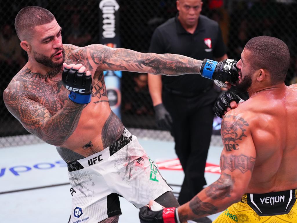 Tyson Pedro (L) announced his retirement after a decision defeat to Vitor Petrino. Picture: Jeff Bottari/Zuffa LLC via Getty Images