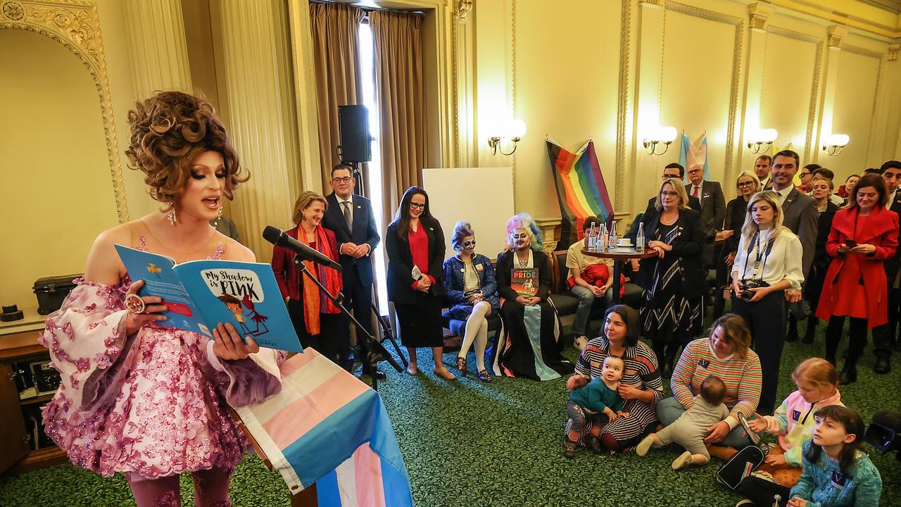 Drag Queen Sam T reads a story book called my Shadow is Pink to some children, Premier Dan Andrew and parliament staff. Picture: David Caird