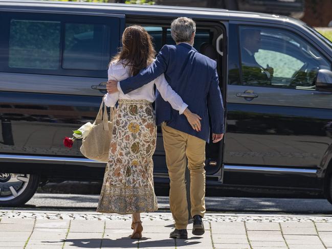 Queen Mary and King Frederik had their arms wrapped around each other in a loving display. Picture: Getty Images