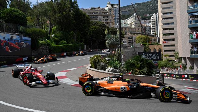 McLaren’s Lando Norris leads Ferrari'Charles Leclerc into the Fairmont Hairpin during the Formula One Monaco Grand Prix. (Photo by Christophe Simon / AFP)