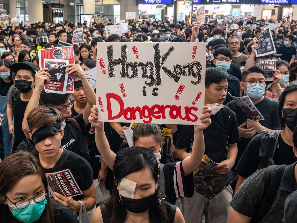 Protesters occupy the arrival hall of the Hong Kong International Airport during a demonstration on August 12, 2019 in Hong Kong, China. Picture: Getty Images