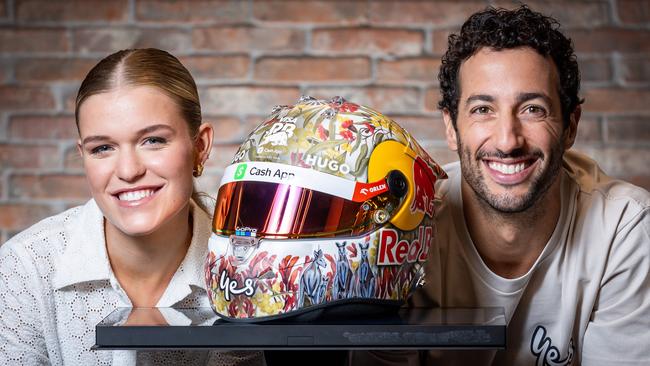 Daniel Ricciardo and his newly designed race helmet by Victorian arts student Rosie Pettenon. Picture: Jake Nowakowski