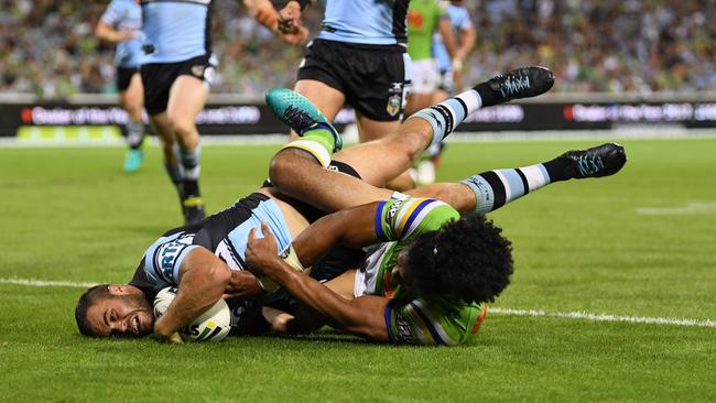 Wade Graham scores one of his three tries against the Raiders on Saturday night. Picture: AAP