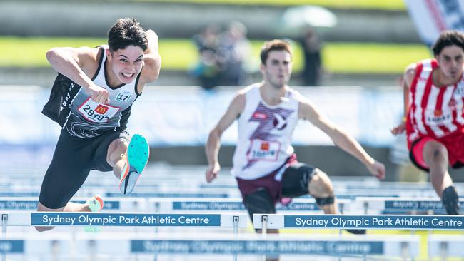 Oliver Facer from Inner West winning the U17 hurdles. Picture: Julian Andrews