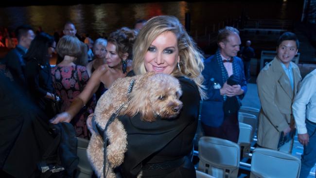 Lawyer Gina Edwards with Oscar the cavoodle in happier times. Picture: Supplied