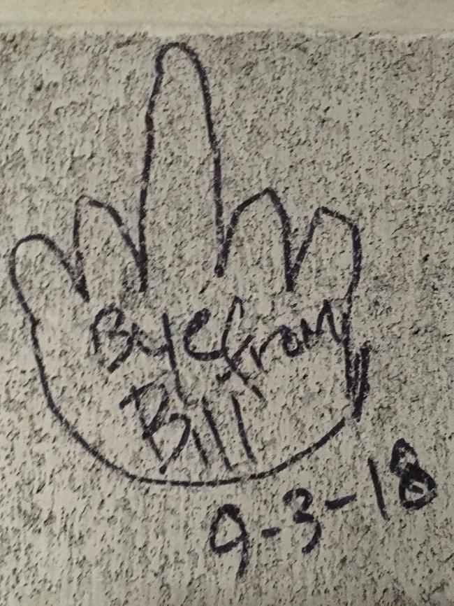 The “Bye from Bill” graffiti.