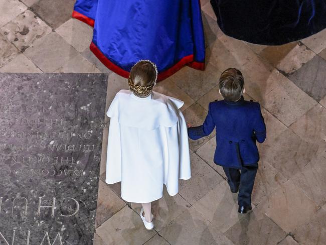 Princess Charlotte and Prince Louis of Wales walk down the aisle hand-in-hand. Picture: Gareth Cattermole/Getty Images