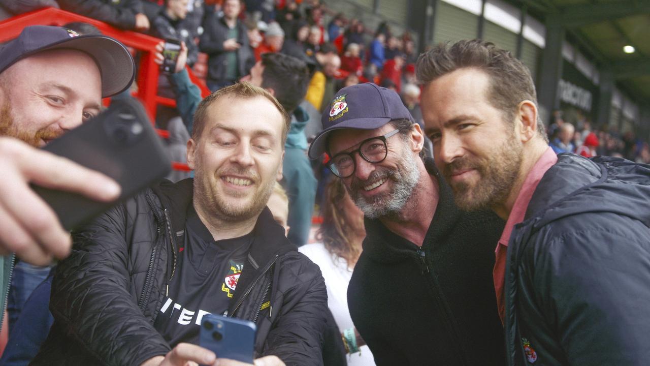 Hugh Jackman and Ryan Reynolds with fans. Picture: FX