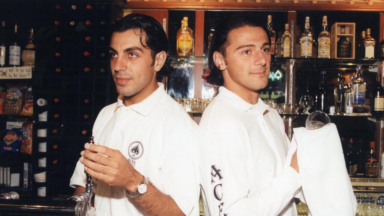 Olyroo soccer teammates Ross Aloisi and Goran Lozanovski are both bartenders at Aces Bar, but the colleagues will become enemies when Aloisi lines up for West Adelaide against Lozanovski's Adelaide City. Picture: 04 Jan 1996.