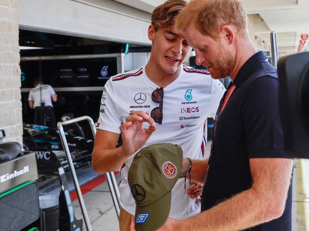 The royal with Mercedes driver George Russell. Picture: Getty Images