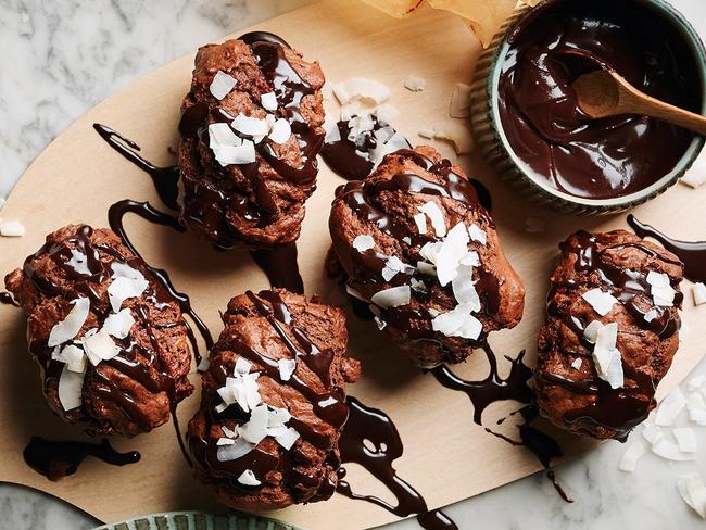 Raspberry lamington muffins with chocolate drizzle.