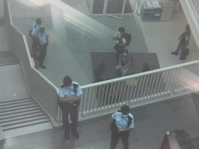 Hong Kong police raid Apple Daily.