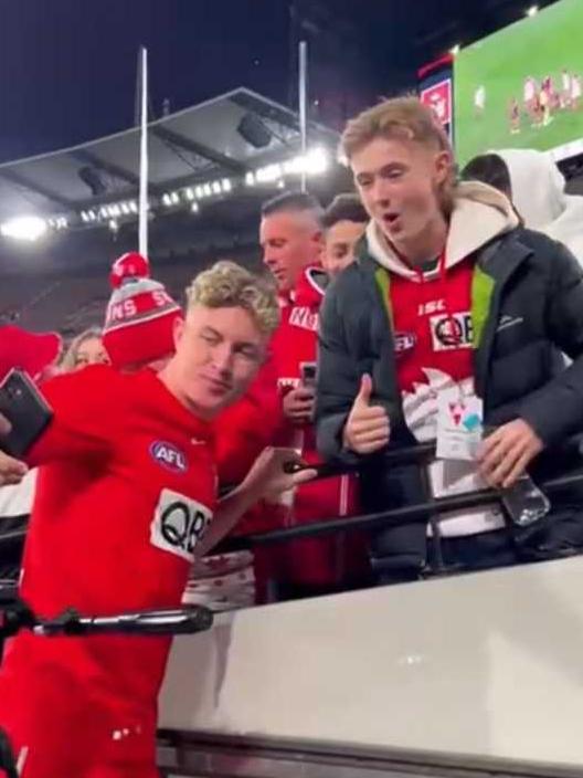 Mick McGuane's son has a photo with Chad Warner. Pic: AFL/Instagram.