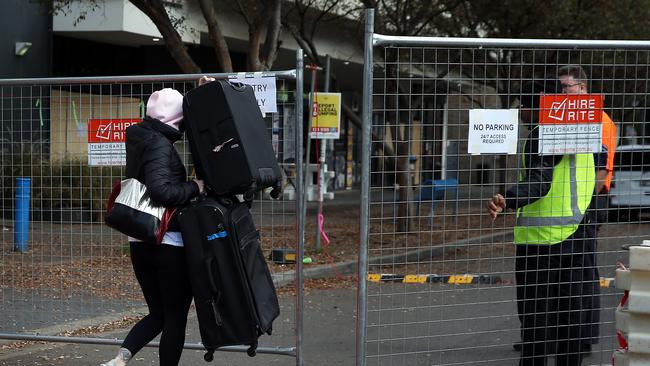 A resident leaving the building after it was evacuated. Picture: Jane Dempster