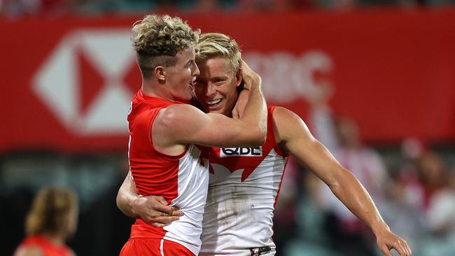 Sydney's Isaac Heeney celebrates with Chad Warner. Photo by Phil Hillyard.