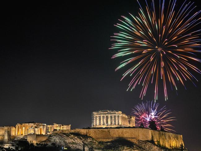 The Parthenon is bathed in light during New Year celebrations. Picture: AFP