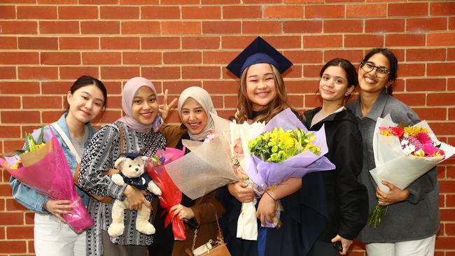 Stephanie Wijaya, Yasmine Assegaf, Fatimah Safria, Fiola Khoe, Fatima Nagia and Nishrin Assegaf at the Deakin University Graduation post ceremony celebration. Picture: Alison Wynd