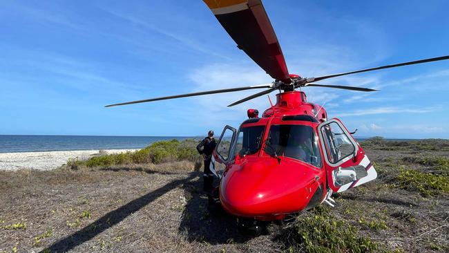 Rescue efforts underway to rush shark bite victim from Clack Island to Cairns Hospital. Picture: QAS