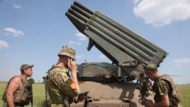 Ukrainian artillerymen prepare to fire a BM-21 Grad multiple rocket launcher near Izyum, south of Kharkiv. Picture: AFP