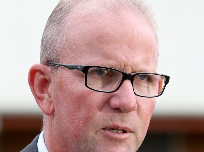 L to R, Ian Leavers President Qld police union, talk to media after A 53-year-old police officer has been killed overnight attempting to stop a stolen car on the Bruce Highway, on Saturday 26th June 2021, Photo Steve Pohlner