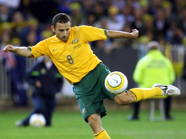 Josip Skoko strikes for the Socceroos.