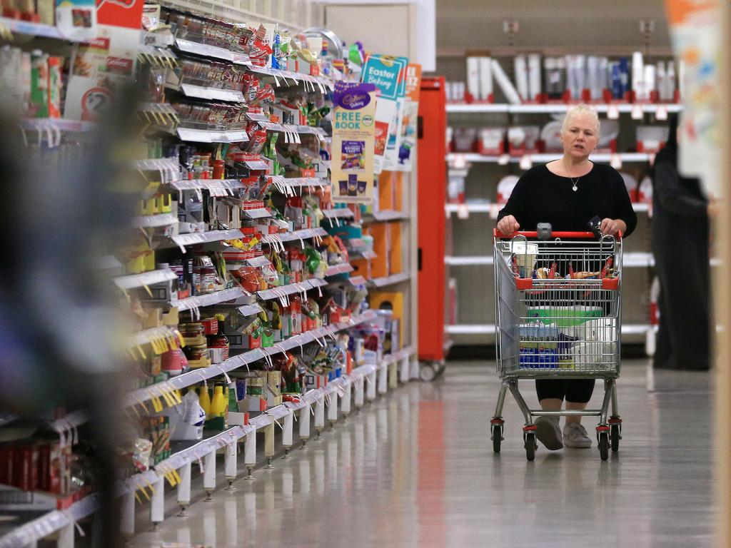 Another shopper inside Coles Coburg during the 7am-8am special shopping hour. Picture: Mark Stewart