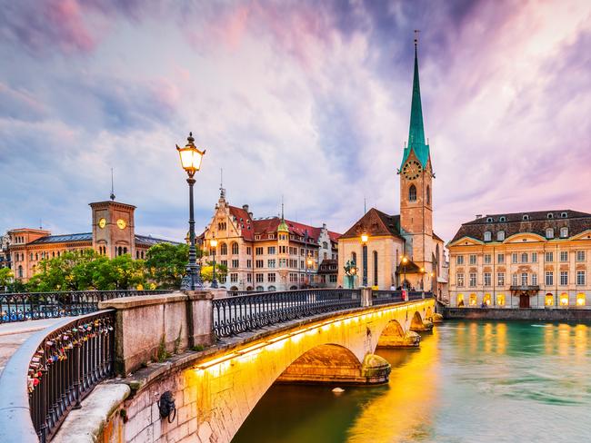 Zurich, Switzerland. View of the historic city center with famous Fraumunster Church, on the Limmat river.Escape 4 June 202348hrs - ZurichPhoto - iStock