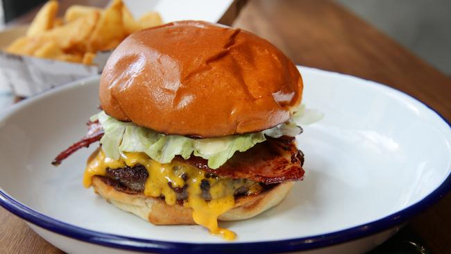 Five Points is located on Berry Street, North Sydney, with a new store opening in Manly soon. Pictured is the Bronx burger and chips.