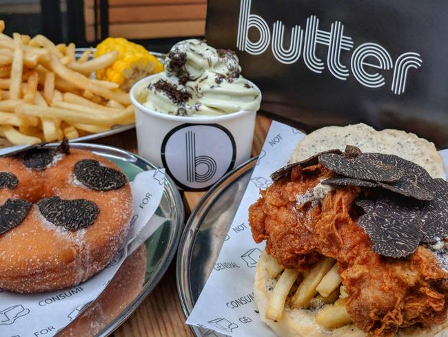 Sugar doughnut topped with truffles, fried chicken sandwich with truffles and a bun slathered with truffle honey butter. Picture: @issac_eatsalot