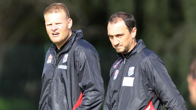 Former Adelaide United coach Josep Gombau (left) with his former assistant Michael Valkanis. Both men are in the running to take over as Melbourne City coach.