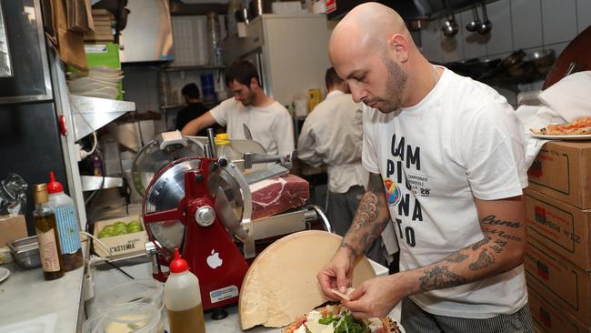 Michele Circhirillo making the award-winning pizza. Picture: David Crosling