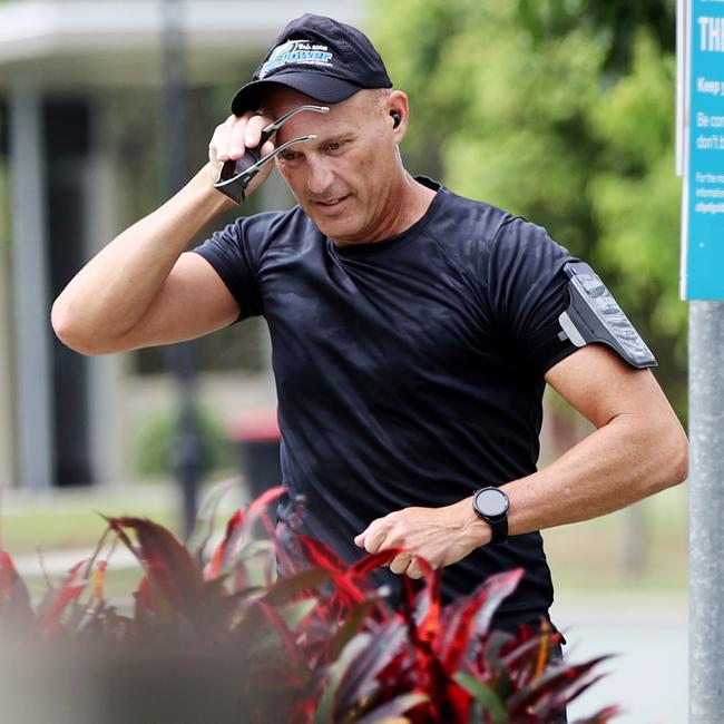 Stood-down cop Senior Sergeant Arron Ottaway out jogging on the Gold Coast. Picture: Nigel Hallett