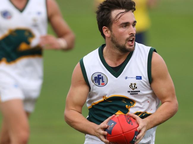 NFL Division 1 Heidelberg v Northcote 20 Brody Ricardi with the ball for Northcote. Picture: Stuart Milligan