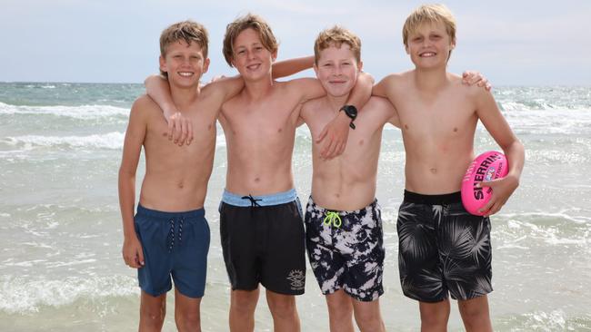 Schoolchildren enjoying a day out on the beach. Picture: Emma Brasier