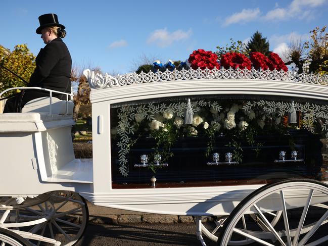 A white horse drawn hearse arrives for the funeral of singer Liam Payne. Picture: Getty Images